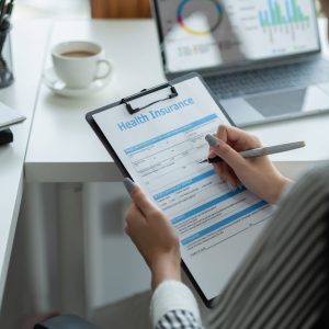 asian-woman-review-and-sign-on-application-for-hea-2022-08-18-23-32-28-utc