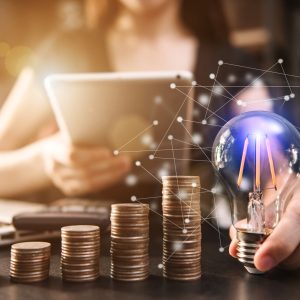 businessman-hand-holding-lightbulb-2024-12-19-16-13-29-utc