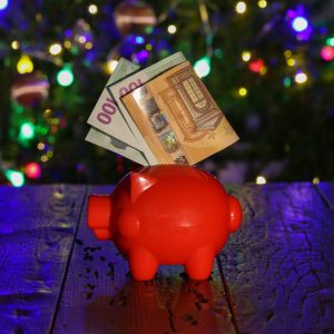 A closeup shot of a piggy bank with saving for Christmas gifts